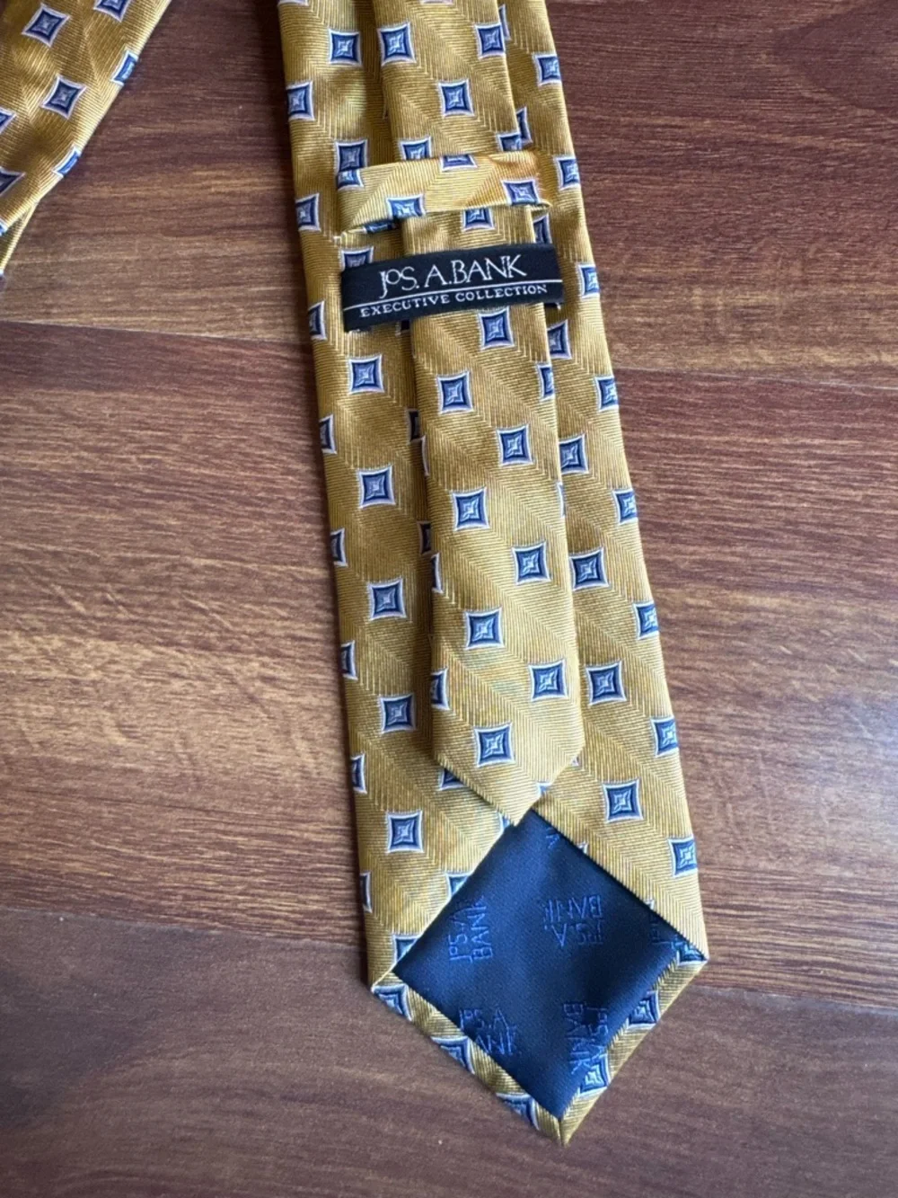 JOS A. BANK Executive Collection Mustard Yellow Tie with Navy Diamond Motif